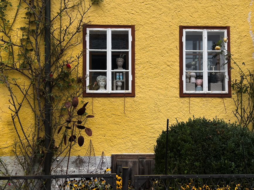 Freshly painted house front with white trim
